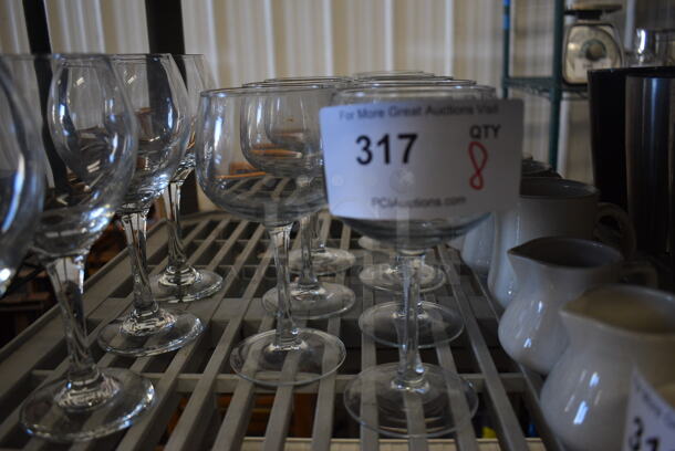 8 Wine Glasses. 3.5x3.5x7. 8 Times Your Bid!