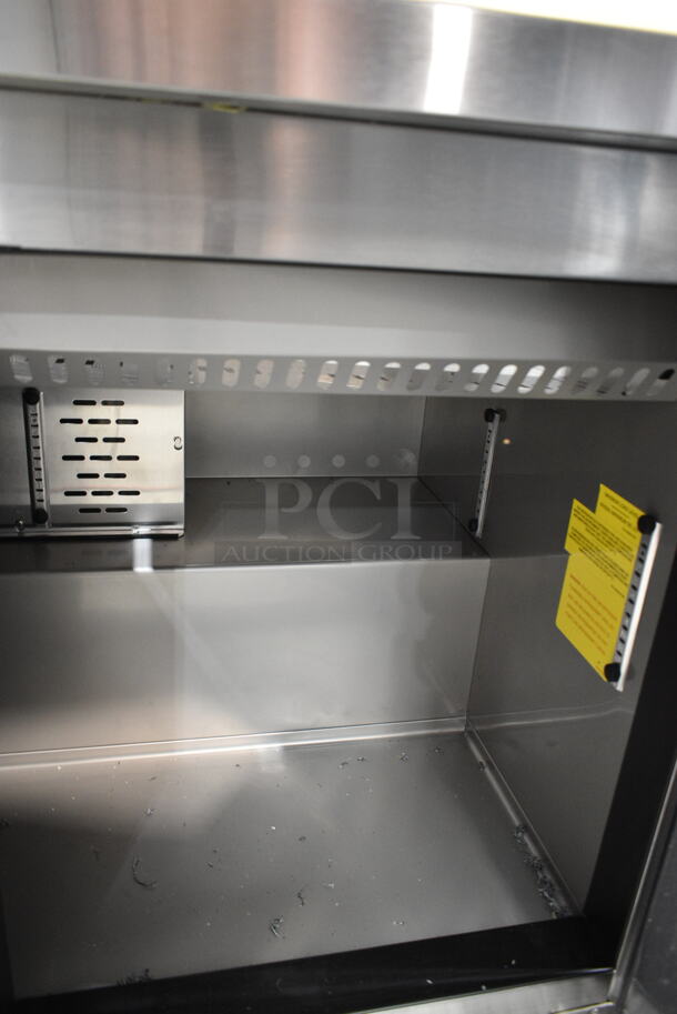 BRAND NEW SCRATCH AND DENT! 2023 Avantco 447APST72 Stainless Steel Commercial Sandwich Salad Prep Table Bain Marie Mega Top on Commercial Casters. 115 Volts, 1 Phase. Tested and Working! - Image 5 of 10
