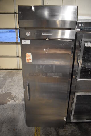Hussmann HR28AT Stainless Steel Commercial Single Door Reach In Cooler w/ Poly Coated Racks on Commercial Casters. 115 Volts, 1 Phase. 28x35.5x81. Tested and Powers On But Temps at 48 Degrees