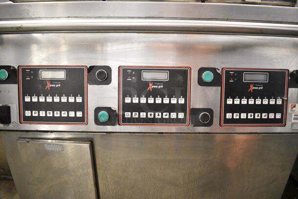 2015 Garland XG36 Stainless Steel Commercial Floor Style Natural Gas Powered  Xpress 36" Semi Automatic Triple Clamshell Grill Griddle on Commercial Casters.   - Image 6 of 12