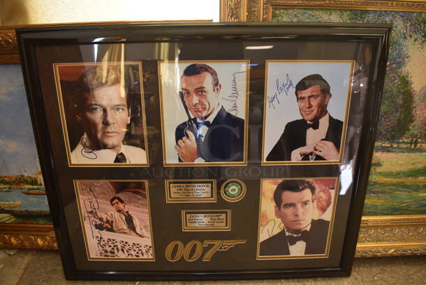 Framed Collage of 5 Autographed James Bonds Actors Including Sean Connery, Roger Moore, Timothy Dalton, Pierce Brosnan, and George Lazenby. Certificate of Authenticity is Attached To Back of Frame.