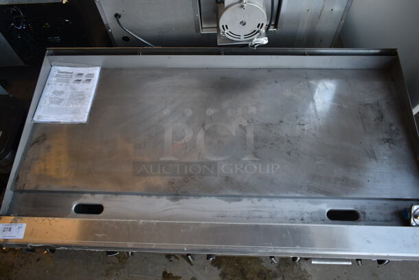 BRAND NEW SCRATCH AND DENT! LATE MODEL! Garland 372GT60GT60N Stainless Steel Commercial Countertop Natural Gas Powered Flat Top Griddle. - Image 3 of 10