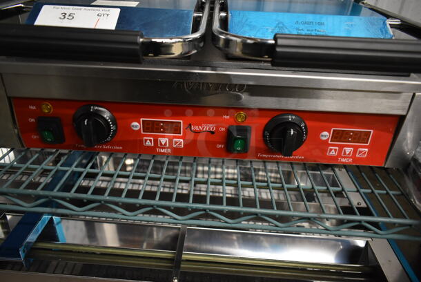 BRAND NEW SCRATCH AND DENT! 2023 Avantco PG400ST Stainless Steel Commercial Countertop Dual Panini Sandwich Grill with Timer, Smooth Plates, and 19 5/8" x 9 1/8" Cooking Surface. 120 Volts, 1 Phase. Tested and Working! - Image 3 of 6