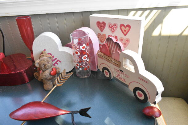 Wall Mount Table w/ Contents Including Valentines Day Decor. BUYER MUST REMOVE: Bring Tools and Manpower Needed To Remove This Item. (booth room)  - Image 9 of 10