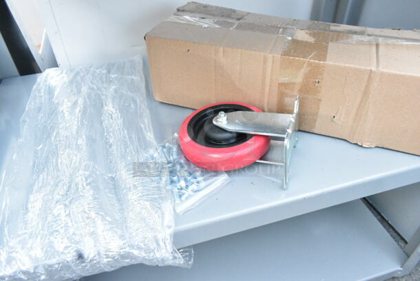 BRAND NEW SCRATCH AND DENT! Lavex Gray Metal 3 Tier Cart w/ Commercial Casters.  - Image 6 of 7