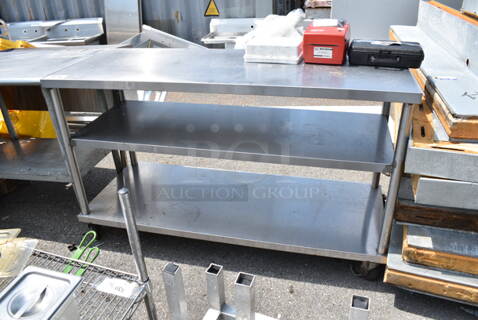 Stainless Steel Table w/ 2 Under Shelves on Commercial Casters. 