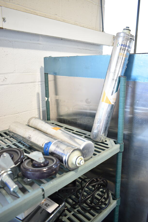 ALL ONE MONEY! Lot of Various Items Including Water Filter Cartridges, Commercial Casters and 2 Jugs of Diversey Rinse Aid.  - Image 2 of 5