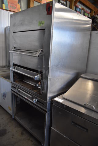 Stainless Steel Commercial Natural Gas Powered Vertical Upright Broiler on Commercial Casters. 36x40x77