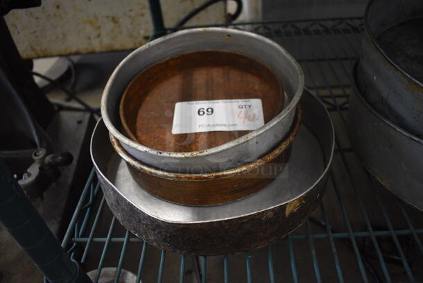 4 Various Metal Round Baking Pans. Includes 8.5x8.5x2. 4 Times Your Bid!