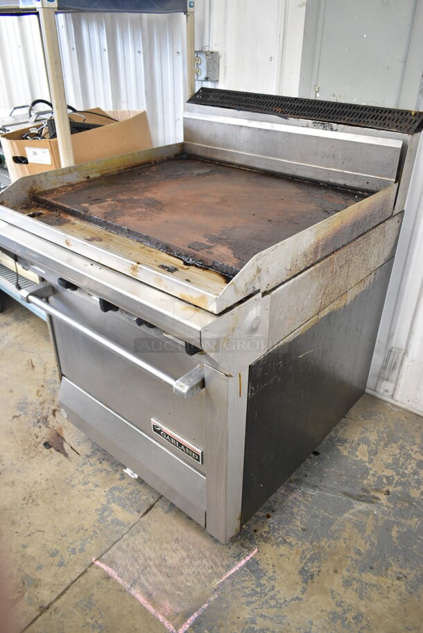 Garland Stainless Steel Commercial Natural Gas Powered Flat Top Griddle w/ Oven.  - Image 2 of 6