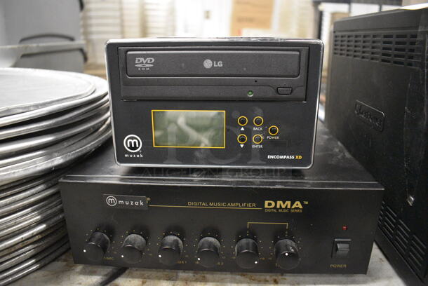 2 Various Items; LG Encompass XD CD Rom Player and Muzak DMA Digital Music Amplifier. 11x11x4, 7x8x4.5. 2 Times Your Bid! - Image 2 of 3