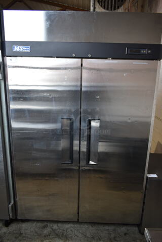 Turbo Air M3R47-2 Stainless Steel Commercial 2 Door Reach In Cooler w/ Poly Coated Racks on Commercial Casters. 115 Volts, 1 Phase. Tested and Powers On But Does Not Get Cold