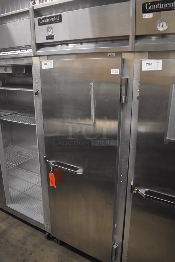 Continental 1FE Stainless Steel Commercial Single Door Reach In Freezer on Commercial Casters. Door Is Locked. 115 Volts, 1 Phase. 28.5x36x77.5. Tested and Powers On But Temps at 46 Degrees