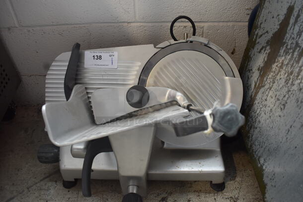 Hobart EDGE12-1 Commercial Stainless Steel  Manual Meat Slicer on Black Rubber Bottom Feet. 115V Tested And Powers On But Does Not work