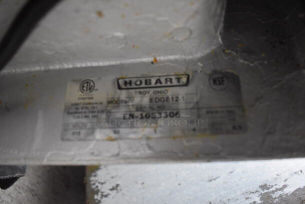 Hobart EDGE12-1 Commercial Stainless Steel  Manual Meat Slicer on Black Rubber Bottom Feet. 115V Tested And Powers On But Does Not work - Image 4 of 4