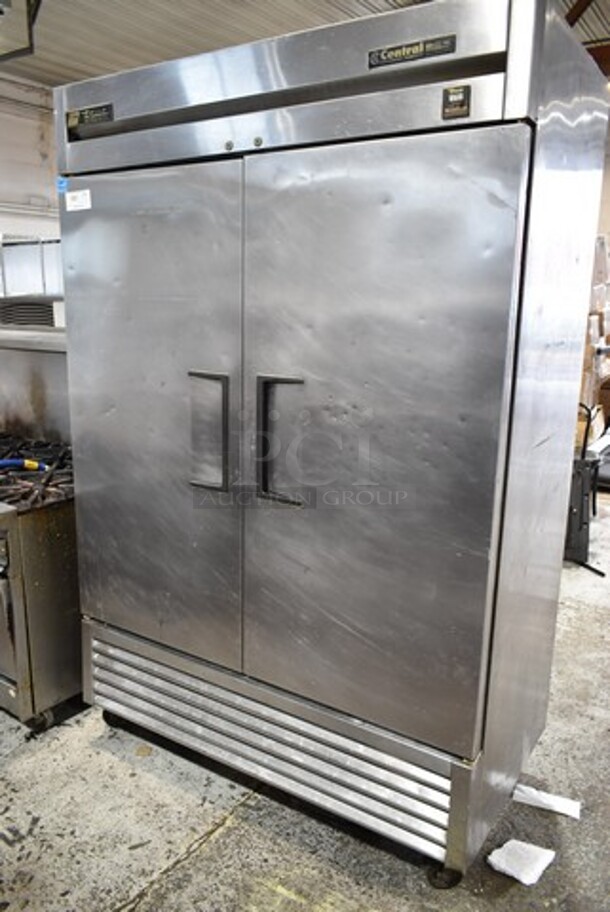 True TS-49 ENERGY STAR Stainless Steel Commercial 2 Door Reach In Cooler w/ Metal Rack, 3 Baking Pans and 2 Poly Coated Racks on Commercial Casters. 115 Volts, 1 Phase. Tested and Working!