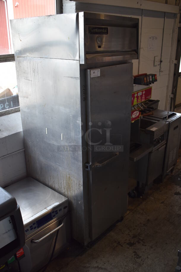 Continental 1R Stainless Steel Commercial Single Door Reach In Cooler w/ Racks on Commercial Casters. 115 Volts, 1 Phase. Tested and Powers On But Does Not Get Cold - Image 2 of 5