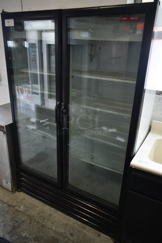 2016 Torrey VRD28-ULH Metal Commercial 2 Door Reach In Cooler Merchandiser w/ Poly Coated Racks. 120 Volts, 1 Phase. Tested and Working!