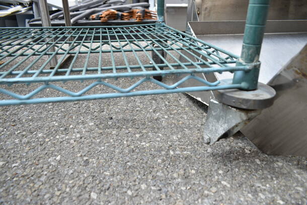 Green Finish 4 Tier Wire Shelving Unit on Commercial Casters. Missing 1 Caster. BUYER MUST DISMANTLE. PCI CANNOT DISMANTLE FOR SHIPPING. PLEASE CONSIDER FREIGHT CHARGES. - Image 4 of 5