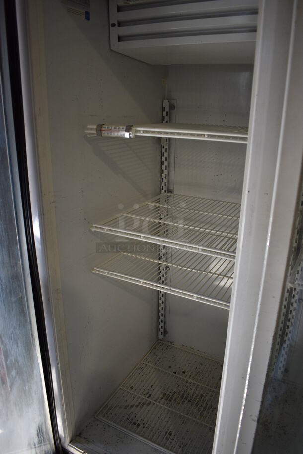 Kelvinator Model T80MGP Metal Commercial 3 Door Reach In Cooler Merchandiser w/ Poly Coated Racks on Commercial Casters. 115 Volts, 1 Phase. 78x37x78. Tested and Working! - Image 3 of 6