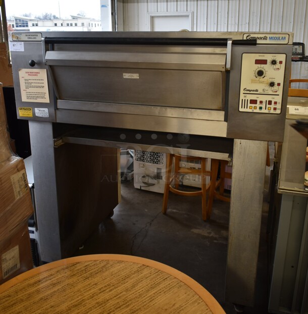 Compacta Modular H6 MK4 MTS 1.2.8 Stainless Steel Commercial Floor Style Electric Powered Single Deck Pizza Oven Bakery Oven on Metal Legs w/ Commercial Casters. 208 Volts, 3 Phase.  - Image 1 of 7