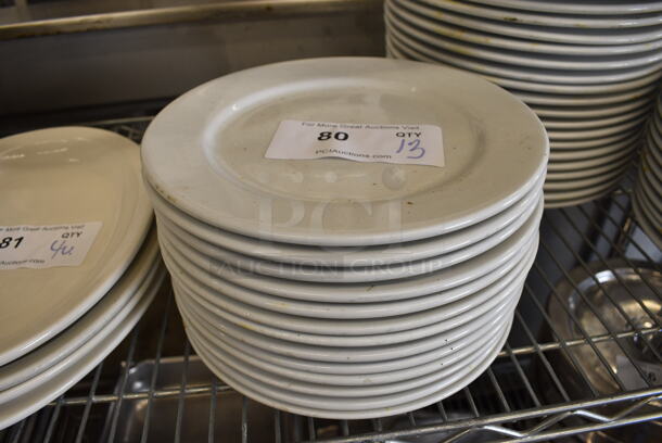 13 White Ceramic Plates. 9.5x9.5x1. 13 Times Your Bid! - Image 1 of 4