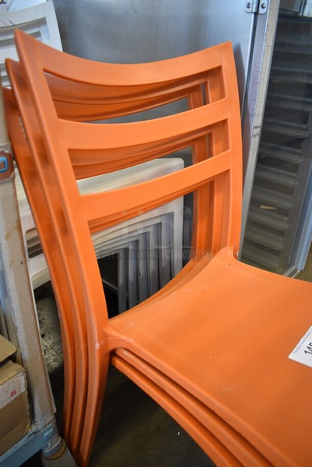 3 Orange Poly Stackable Chairs. 18x19x33.5. 3 Times Your Bid! - Image 3 of 4