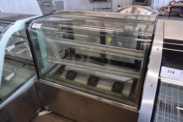 Stainless Steel Commercial Floor Style Deli Display Case Merchandiser. See Picture For Crack on Side Pane. Tested and Powers On But Does Not Get Cold - Image 2 of 7