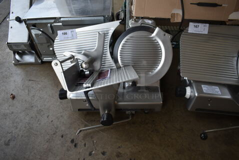 BRAND NEW SCRATCH AND DENT! Estella 348SLM12 Stainless Steel Commercial Countertop Automatic Meat Slicer w/ Blade Sharpener. 120 Volts, 1 Phase. Tested and Working!
