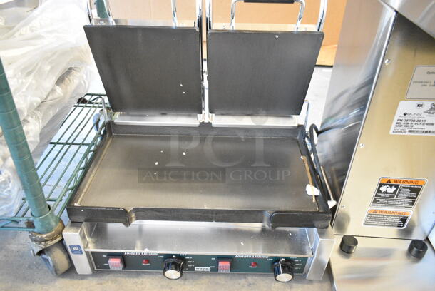BRAND NEW SCRATCH AND DENT! 2024 Waring WFG300 Stainless Steel Commercial Tostato Ottimo Smooth Top & Bottom Dual Panini Sandwich Grill - 17" x 9 1/4" Cooking Surface. 240 Volts, 1 Phase.  - Image 8 of 9