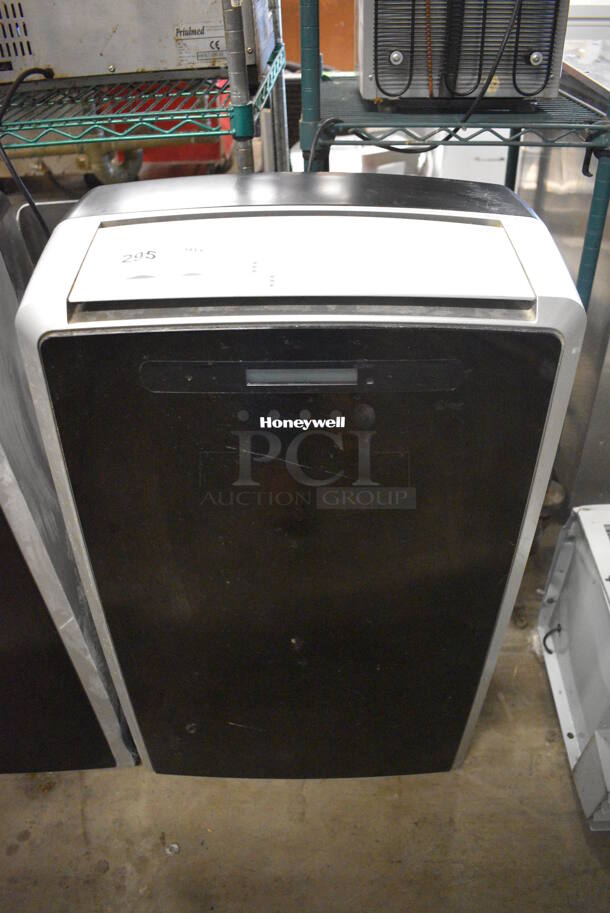 Honeywell Model MM14CCS Portable Air Conditioner on Casters. 115 Volts, 1 Phase. 18x15x34. Tested and Working!