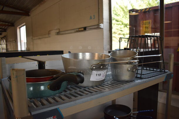 ALL ONE MONEY! Tier Lot of 6 Various Items; 5 Sauce Pots and Metal Cutting Board Rack. Includes 18x10x5.5