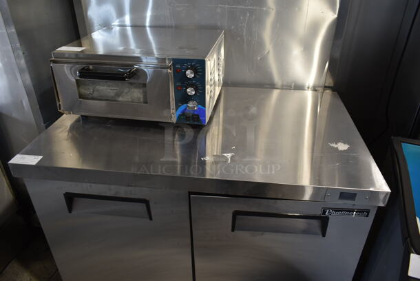 BRAND NEW SCRATCH AND DENT! Bluelinetech BUC48FA Stainless Steel Commercial 2 Door Undercounter Freezer on Commercial Casters. 115 Volts, 1 Phase. Tested and Working! - Image 3 of 7