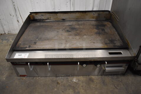 APW Wyott Stainless Steel Commercial Countertop Natural Gas Powered Flat Top Griddle. 36x26x12