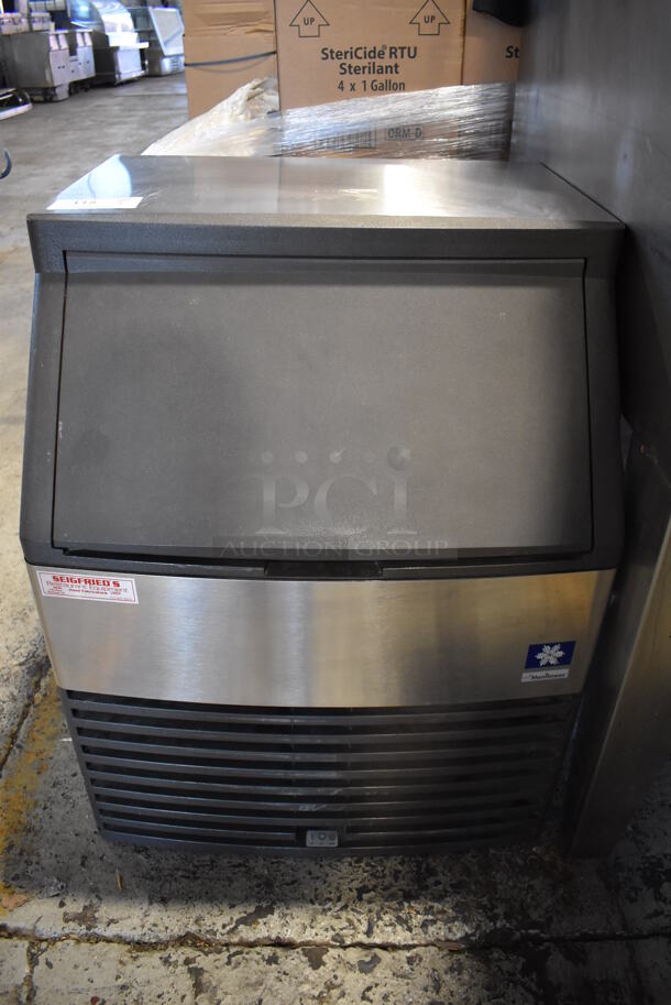 2012 Manitowoc QY0134A Stainless Steel Commercial Self Contained Undercounter Ice Machine. 115 Volts, 1 Phase. 26x28x33