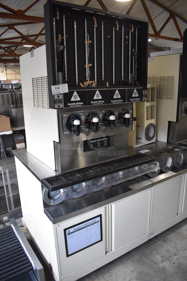 FBD Model FBD564 RC Stainless Steel Commercial Countertop 4 Flavor Slushie Machine on Stainless Steel Soda Station w/ 5 Cup Dispensers and 2 Doors. 208-230 Volts, 1 Phase. 36x42x79 - Image 1 of 9