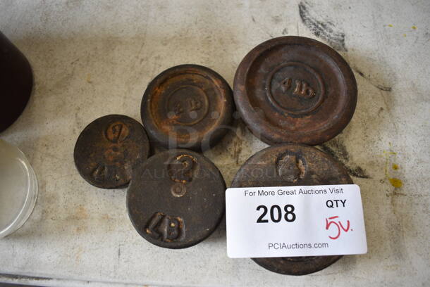 5 Metal Weights; 1 Pound, Two 2 Pound and 2 Four Pound. Includes 4x4x1.5. 5 Times Your Bid! - Image 1 of 3