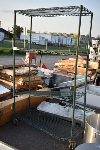 Green Finish 4 Tier Wire Shelving Unit on Commercial Casters. BUYER MUST DISMANTLE. PCI CANNOT DISMANTLE FOR SHIPPING. PLEASE CONSIDER FREIGHT CHARGES.