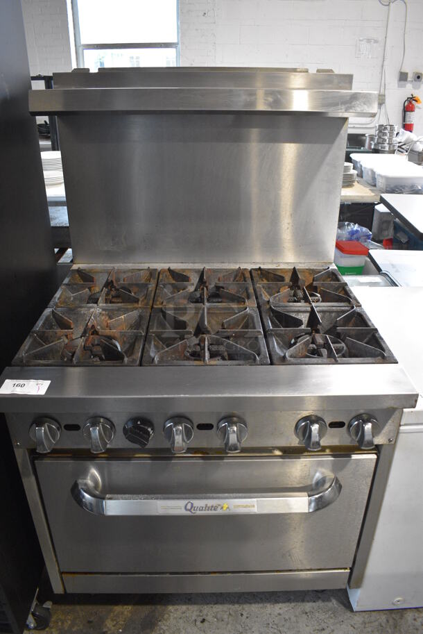 Qualite Stainless Steel Commercial Floor Style Natural Gas Powered 6 Burner Range w/ Oven, Over Shelf and Back Splash. Comes w/ Gas Hose. 36x33x62