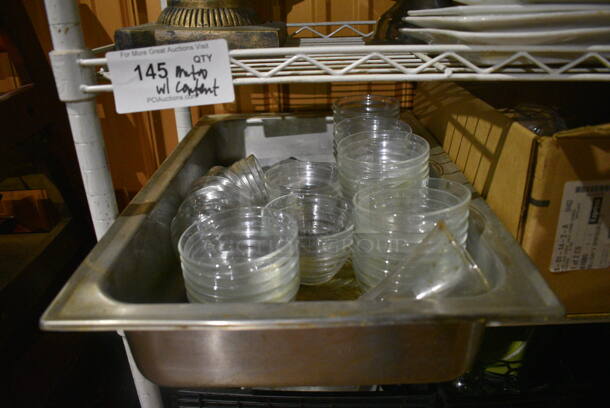 White Finish 4 Tier Shelving Unit w/ Contents Including Chafing Dish Frames, Cake Stands, Glass Bowls. BUYER MUST REMOVE. BUYER MUST DISMANTLE. PCI CANNOT DISMANTLE FOR SHIPPING. PLEASE CONSIDER FREIGHT CHARGES. 36x14x55. (bar) - Image 4 of 6