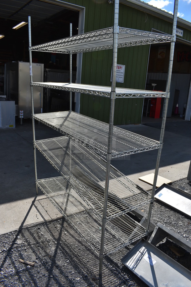 Chrome Finish 5 Tier Shelving Unit. BUYER MUST DISMANTLE. PCI CANNOT DISMANTLE FOR SHIPPING. PLEASE CONSIDER FREIGHT CHARGES. 60x21x84 - Image 1 of 4