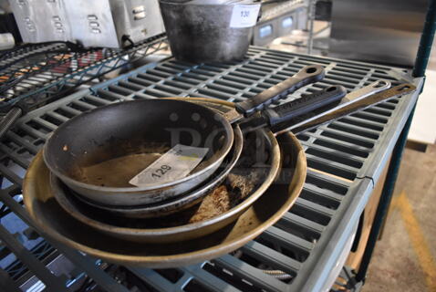 4 Various Metal Skillets. Includes 15x8.5x2. 4 Times Your Bid!