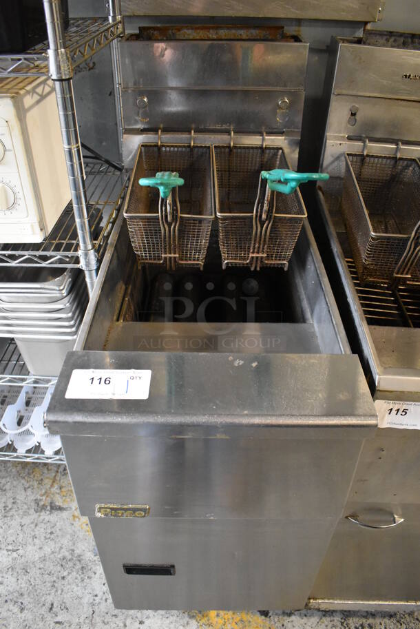 Pitco Frialator SG14R Stainless Steel Commercial Floor Style Natural Gas Powered Deep Fat Fryer w/ 2 Metal Fry Baskets on Commercial Casters. 122,000 BTU. 15.5x34x48