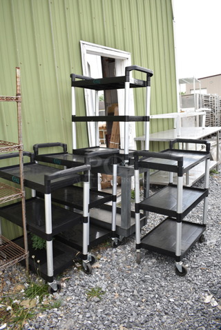 5 Various Poly Carts; Four Black 3 Tier and 1 Gray 2 Tier. 32x16x40, 34.5x17.5x31.5. 5 Times Your Bid!