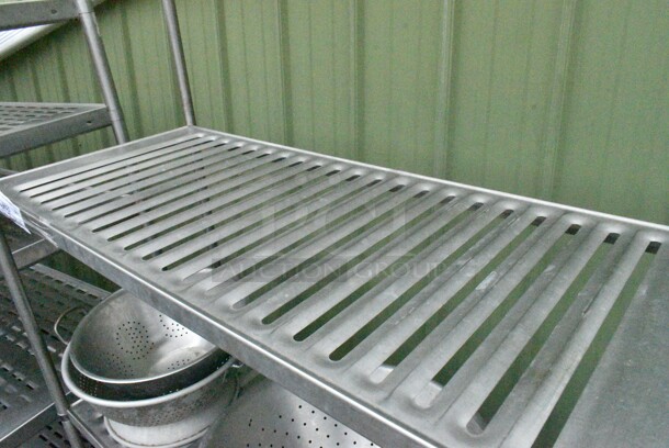 Metal 4 Tier Shelving Unit w/ Contents Including Colanders. BUYER MUST DISMANTLE. PCI CANNOT DISMANTLE FOR SHIPPING. PLEASE CONSIDER FREIGHT CHARGES.
 - Image 9 of 9