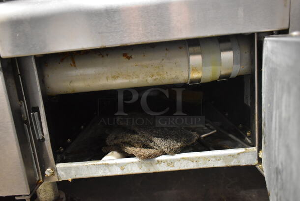 2014 Frymaster FMPH355SC Stainless Steel Commercial Floor Style 3 Bay Deep Fat Fryer w/ Fry Basket Hanging Station and 14 Metal Fry Baskets on Commercial Casters. 80,000 BTU. Unit Was Working When Removed. - Image 10 of 12