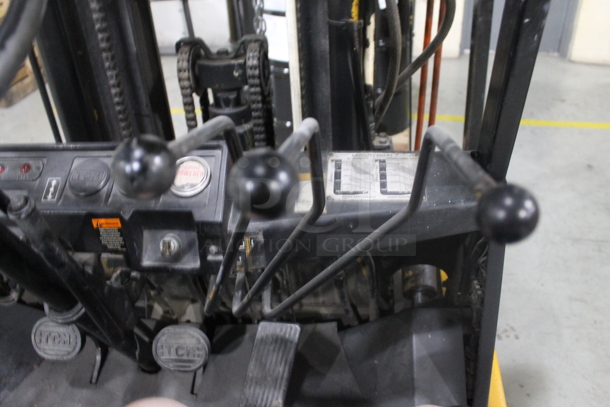 TCM FG20 Metal Commercial Propane Gas Powered Riding Forklift. Hours Read 1,550. BUYER MUST REMOVE: This Item CANNOT Be Transported; Must Pick Up By Appointment Only Approximately 1 Week After Auction Ends; Forklift Will Be Used During Pick Up Day. - Image 10 of 12