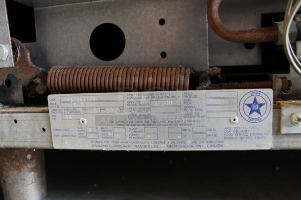 Garland S-6-26 Stainless Steel Commercial Natural Gas Powered 6 Burner Range w/ Oven, Over Shelf and Back Splash.  - Image 5 of 6