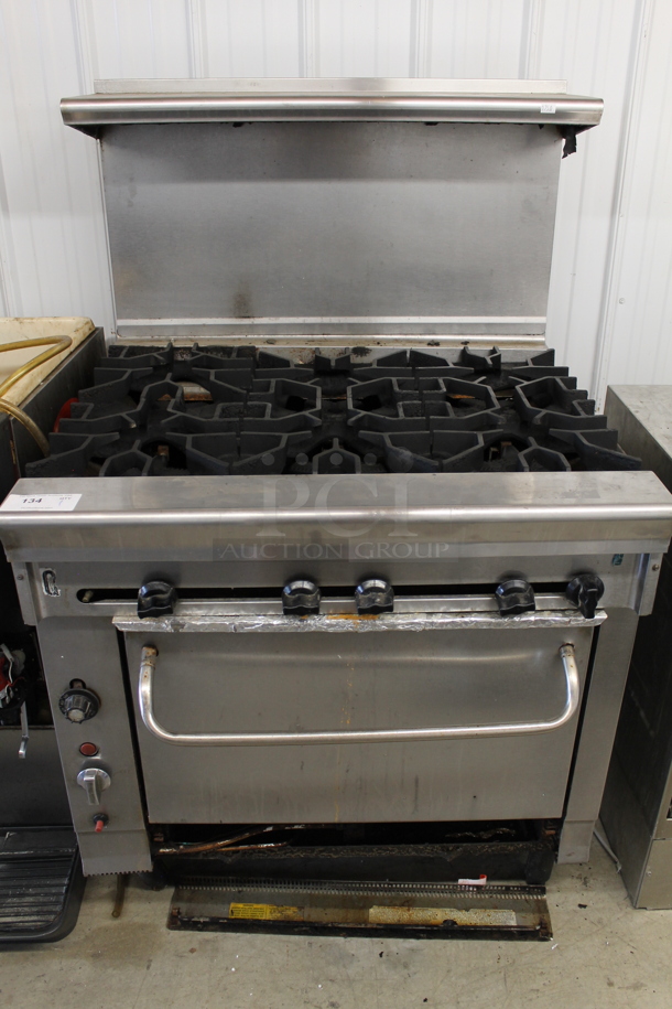 Stainless Steel Commercial Natural Gas Powered 6 Burner Range w/ Oven, Over Shelf and Back Splash. - Image 1 of 4