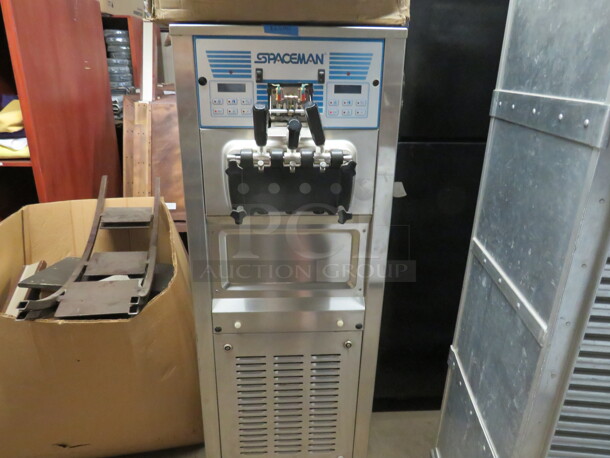 One Spaceman 2 Flavor Twist Water Cooled Frozen Yogurt Machine On Casters. 220 Volt. 3 Phase. Model# 6378AW. 27X33X60. 